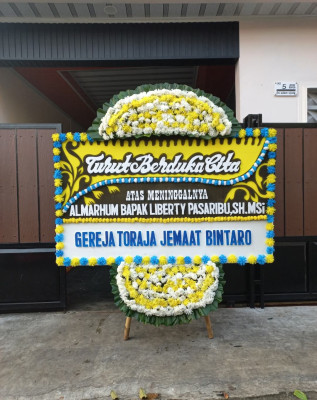 Papan Bunga Duka di Jayanti